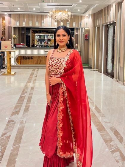 A full-length view of my red ethnic outfit. Strength training has given me the confidence to wear anything I want and feel good in it.