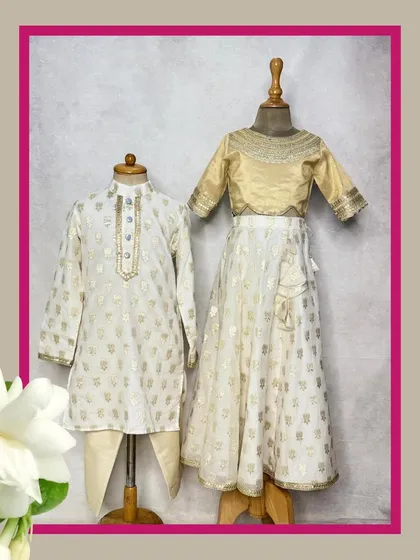 For a ghar ki shaadi or Diwali, nothing beats the elegance of our Mogra collection. We designed this coordinated brother-sister set in classic white and gold for a timeless festive look.