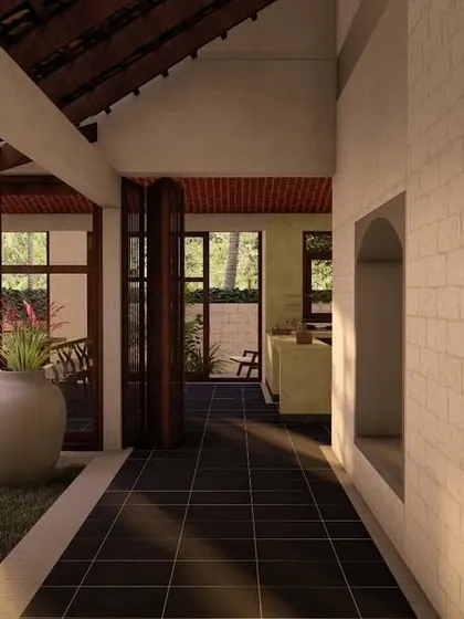The interior courtyard of the laterite villa in Morjim, designed to bring light and greenery into the heart of the home.