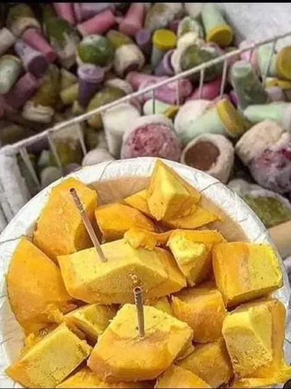 A taste of Old Delhi with my traditional kulfi. Here, mango kulfi is served alongside a freezer full of various kulfi flavors, a perfect dessert for a summer event.