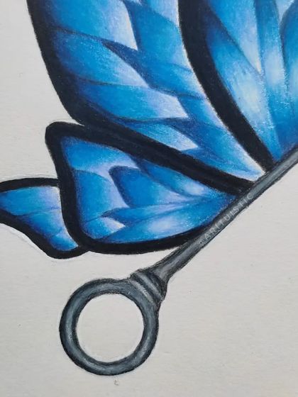 A detail shot of the key's handle and lower wing.