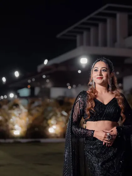 Another shot of my "Back with Black" look. A classic black outfit with a modern twist is always a winning choice for an evening event.