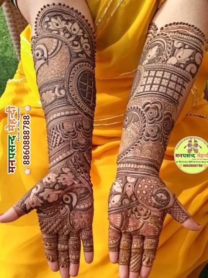 A stunning example of a full-coverage Arabic-style mehndi. The design is dense with intricate paisleys, florals, and geometric fills, creating a rich and luxurious look.