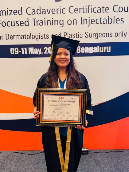 I believe continuous learning is essential to providing the best care. Here I am receiving a certificate for completing a customized cadaveric course on injectables, ensuring my techniques are precise and safe.