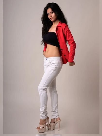 A full-length view of the same outfit, with a confident pose that exudes style.