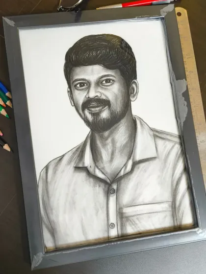 A finished charcoal portrait, framed and ready for display. This piece shows the sharp, realistic detail I can achieve with traditional sketching techniques.