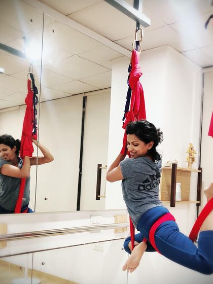 How are you hanging today? This pose is a great stretch for the hips and quadriceps, and the hammock allows you to control the intensity.