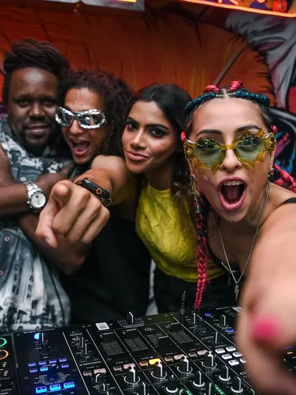 The whole crew pointing at the camera. We see you, fam!