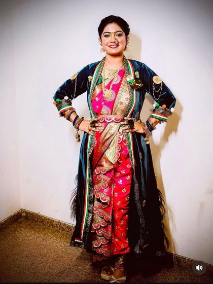 A unique and stylish take on the Nauvari, paired with a long velvet jacket. This is for the bride who wants to make a fashion statement.