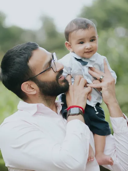 A father's love for his son. This tender moment is a beautiful memory captured forever.