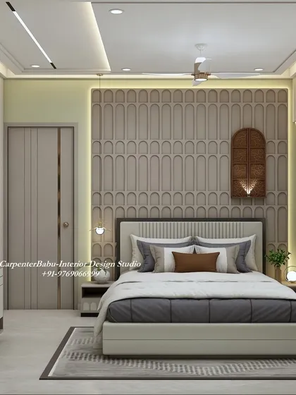 A bedroom with a calm, neutral color scheme. The headboard wall is adorned with 3D arched panels, adding a subtle texture and pattern to the serene space.