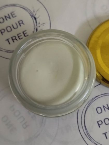 An open jar of my Odour Control Deodorant. It's a cream-based, natural deodorant made with ingredients like tea tree oil and lavender to effectively control odor without blocking your sweat glands.