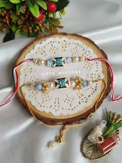 A stunning blue meenakari Rakhi set, adding a touch of royal elegance to your festivities.