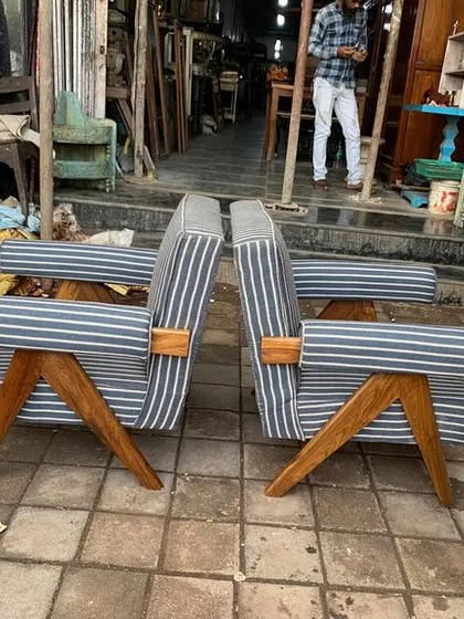 Back-to-back view of the striped armchairs.