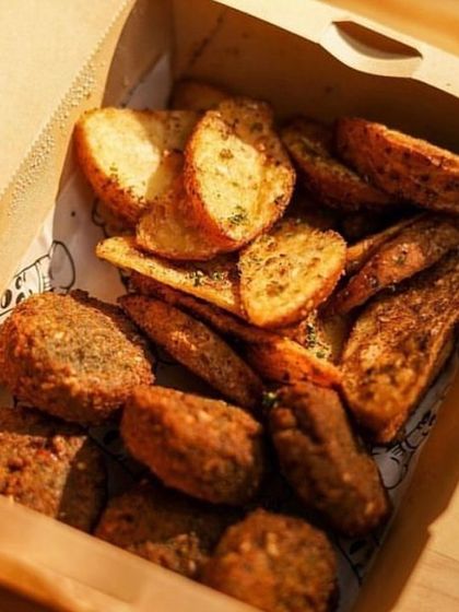 The perfect snack box for game night, featuring crispy falafel and seasoned potato wedges from our bestselling Lebanese Platter.