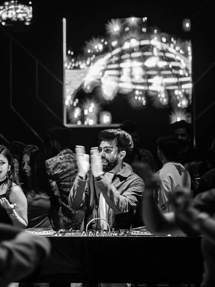 Clapping along with the crowd at Sunburn. It's all about creating a unified experience where everyone is part of the show.