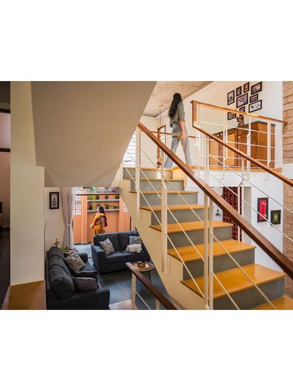 Additional views showcasing the variety of interior spaces we design, from living rooms and bedrooms to staircases and quiet corners, all united by our philosophy of sustainable, soulful design.