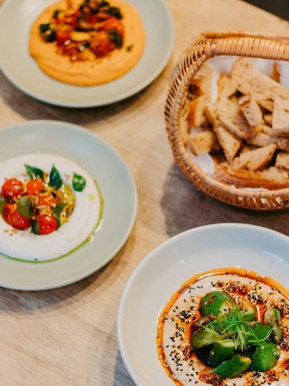 A beautiful spread of our new small plates. Each dish is designed to be fresh, nourishing, and perfect for sharing.