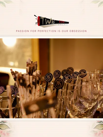 Personalized stirrers and straws with the couple's initials, "AS," ensuring every detail of the bar service is on-brand for the Sangeet.