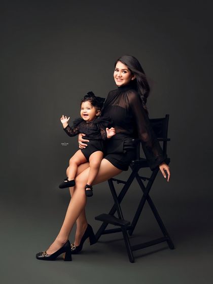 This mother-daughter duo is ready to take on the world! A fun and fashionable shot full of energy.