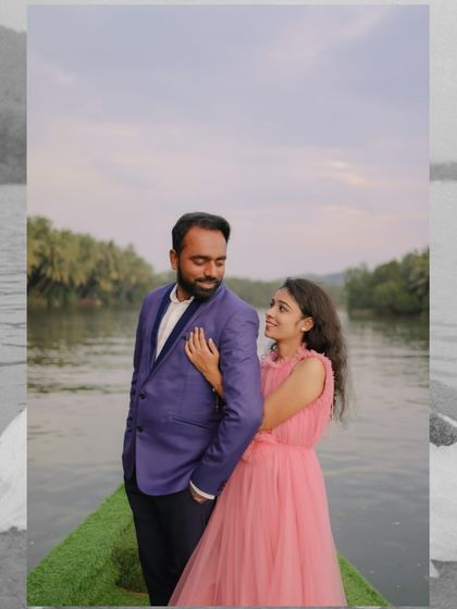 An intimate moment from a pre-wedding boat shoot. The soft pink of the gown complements the romantic and gentle atmosphere.