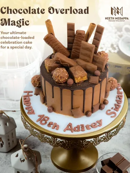 For the ultimate chocolate lover, I present the Chocolate Overload cake. This rich chocolate drip cake is loaded with an assortment of favorite treats like Ferrero Rocher, KitKats, and chocolate rolls, making it the perfect indulgent centerpiece for a milestone 18th birthday.
