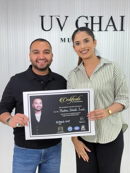 I believe in always learning and upgrading my skills. Here I am receiving my certificate from my own mentor, the amazing UV Ghai. This dedication to learning is what I bring to all my students.