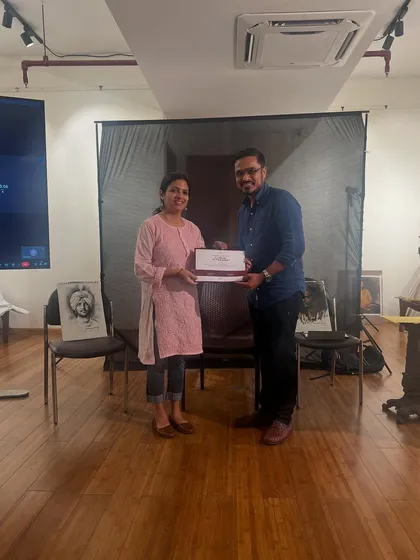Receiving my certificate of participation from Pramod Kurlekar after the portrait painting workshop. Cherishing these memories forever.