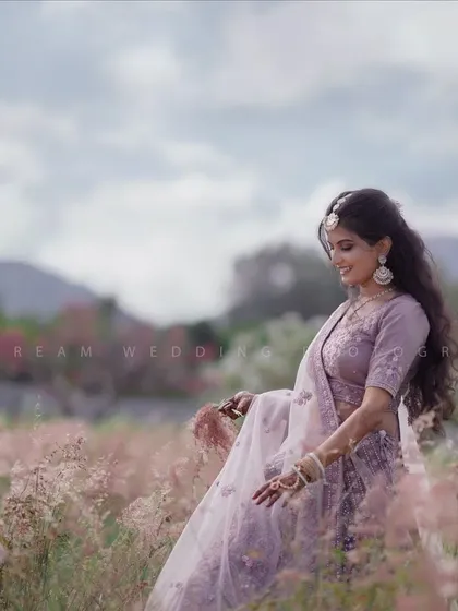 This romantic pre-wedding shoot in a field of flowers called for a soft and dreamy makeup look. I used natural tones and a light touch to enhance her beauty, ensuring the makeup looked fresh and effortless in the beautiful daylight.