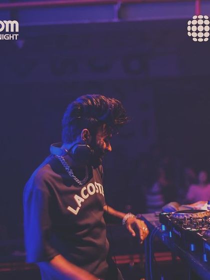 Headphones on, ready to mix at Sunburn Union.