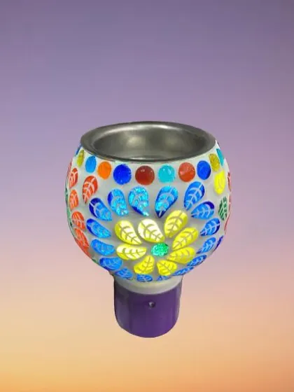 This plug-in diffuser features a lovely floral mosaic pattern with bright yellow and blue petals. It's a wonderful way to bring a touch of nature and art into your home while enjoying a pleasant fragrance.
