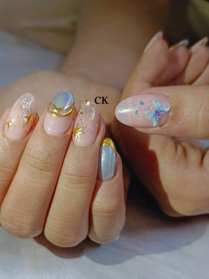 A whimsical set with gold stars, a 3D butterfly, and other sparkling embellishments.