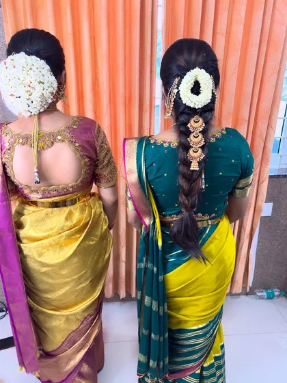 Showcasing two different traditional hairstyles side-by-side. On the left, a full floral bun, and on the right, a simple braid, demonstrating options for the bride or bridesmaids.