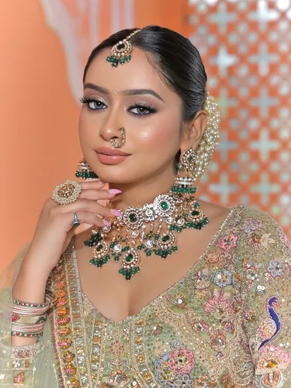 This shot highlights the statement ring and bangles, showing how every piece of jewellery works together to create a cohesive and stunning bridal look.