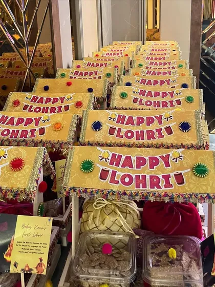 Beautifully crafted Lohri party favors, designed to look like traditional carts and filled with festive treats.