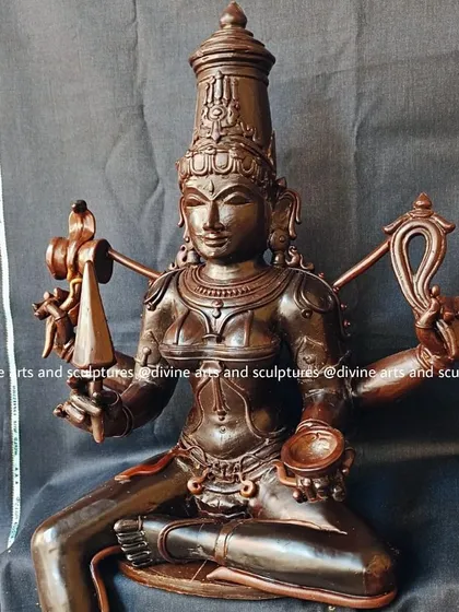 A wax model of Mariamman, the South Indian mother goddess. We explain to our clients that her name signifies "Mother Rain," as she is worshipped for bringing rains and curing diseases.