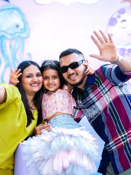 The happy family waving from their daughter's mermaid-themed 5th birthday party. I'm so grateful they trusted me with this special day.