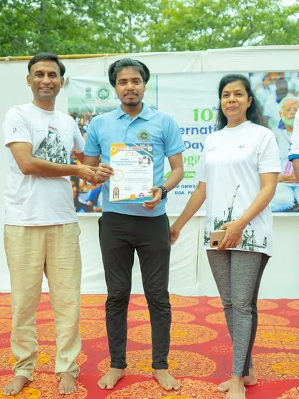 A proud moment, being recognized for my contribution to the Yoga Day event.