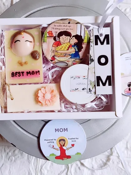 A complete Mother's Day gift hamper with a "Best Mom" soap, fridge magnet, and other goodies.