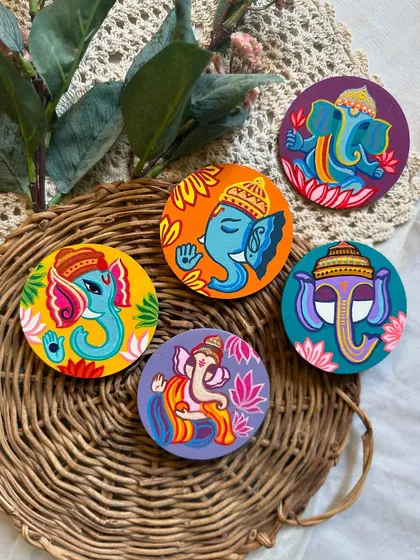 A set of five fridge magnets featuring different artistic interpretations of Lord Ganesha, made for a client.
