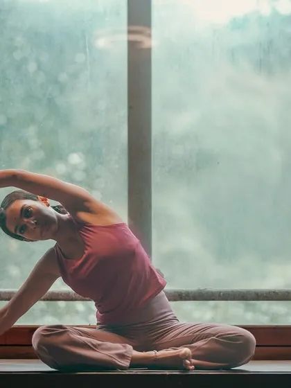 Finding a moment of serene stillness by the window. This is what my practice is about: creating quiet spaces in our day to listen to our bodies, stretch with intention, and connect with the peace that is always within us.