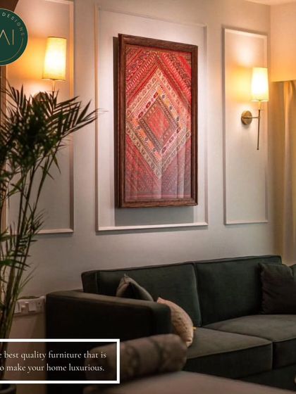 This living room scene pairs a simple, modern dark green sofa with warm lighting and natural elements. It demonstrates how our furniture can create a cozy and luxurious atmosphere.