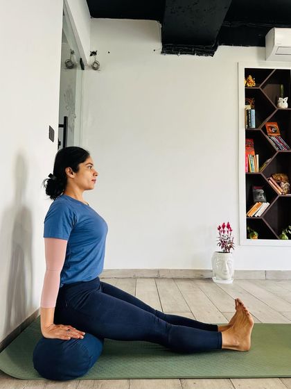 The type of support you use matters. A soft bolster allows the buttocks to sink, providing lateral support in Dandasana (Staff Pose). This is often more comfortable for beginners or those with tight hamstrings.