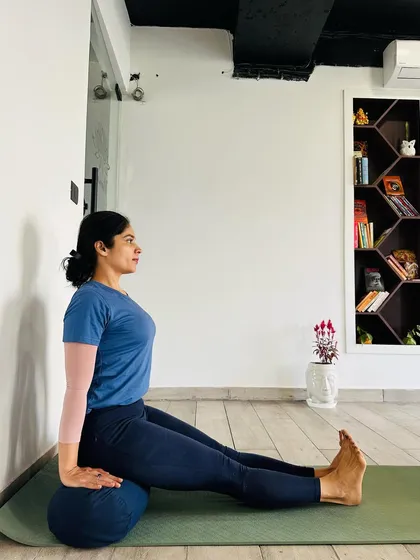The type of support you use matters. A soft bolster allows the buttocks to sink, providing lateral support in Dandasana (Staff Pose). This is often more comfortable for beginners or those with tight hamstrings.