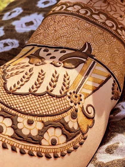 Another work in progress. Here you can see the details of a traditional baraat (wedding procession) scene being created on the arm.