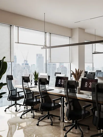 A modern office space with an open-plan workstation area, rendered to feel bright, airy, and collaborative.
