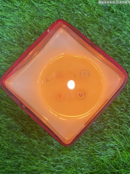 Light it up and let the secret unfold. This hidden message candle reveals words as it burns.