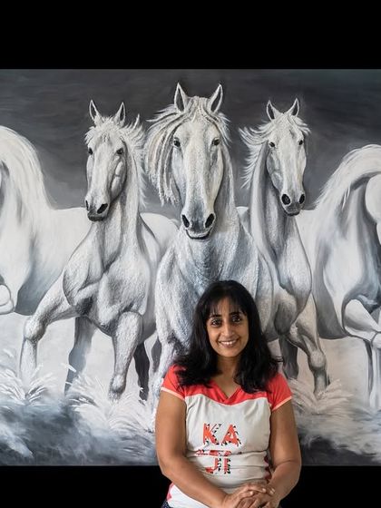 A moment of happiness with the completed seven horses painting. This piece is a testament to finding joy and purpose in my creative journey.