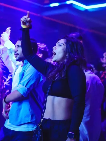 A close-up of the crowd, completely lost in the music. This is the reaction I aim for, ensuring the brand's event is a massive success.