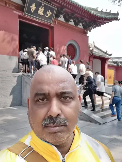 At the main entrance to the Shaolin Monastery in China. This is a place where countless martial artists have begun their journey.